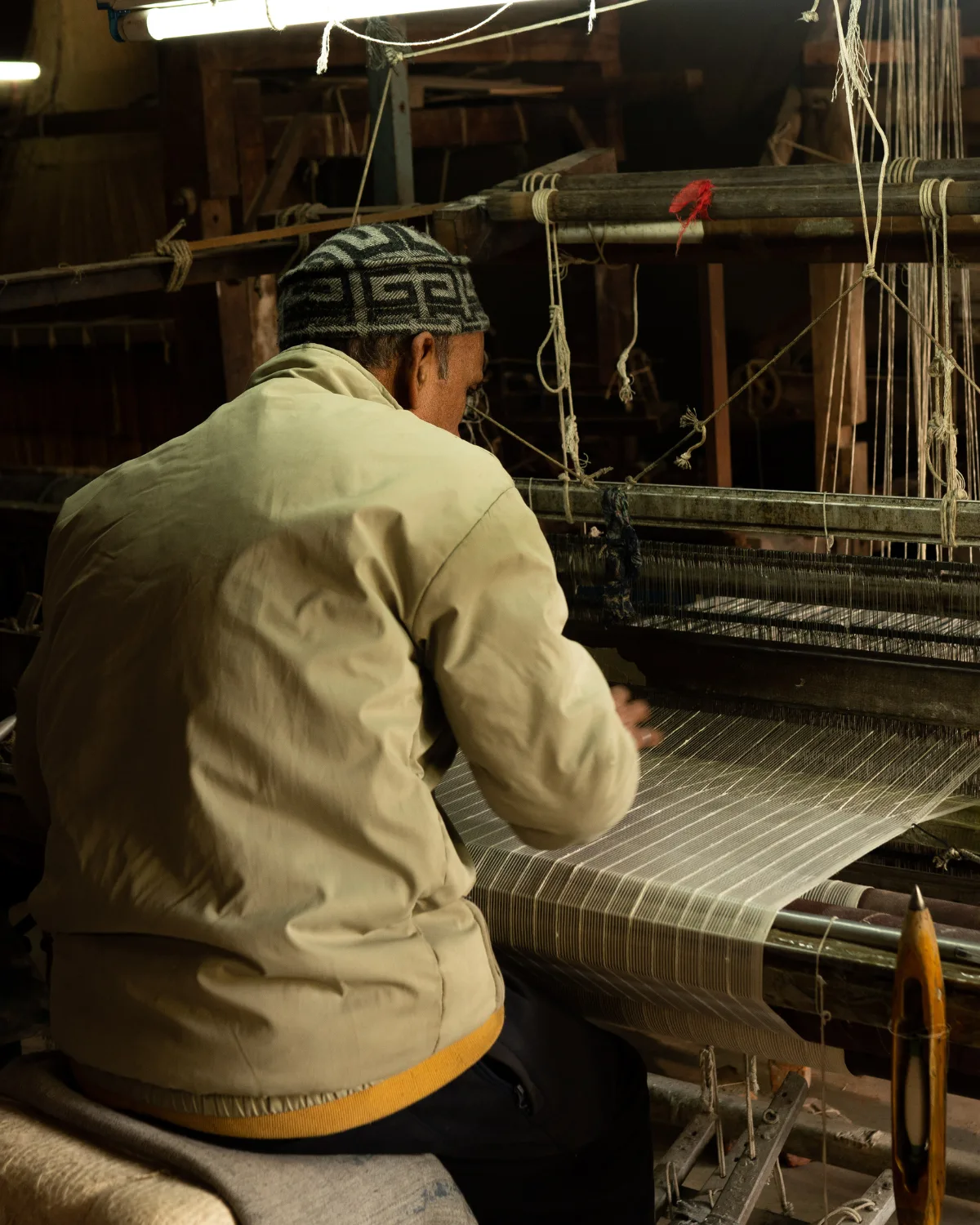 A craftsperson at work in their Kathmandu valley workshop